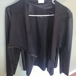 Women’s faux leather and suade jacket. Side zipper. Never warn. Size small.